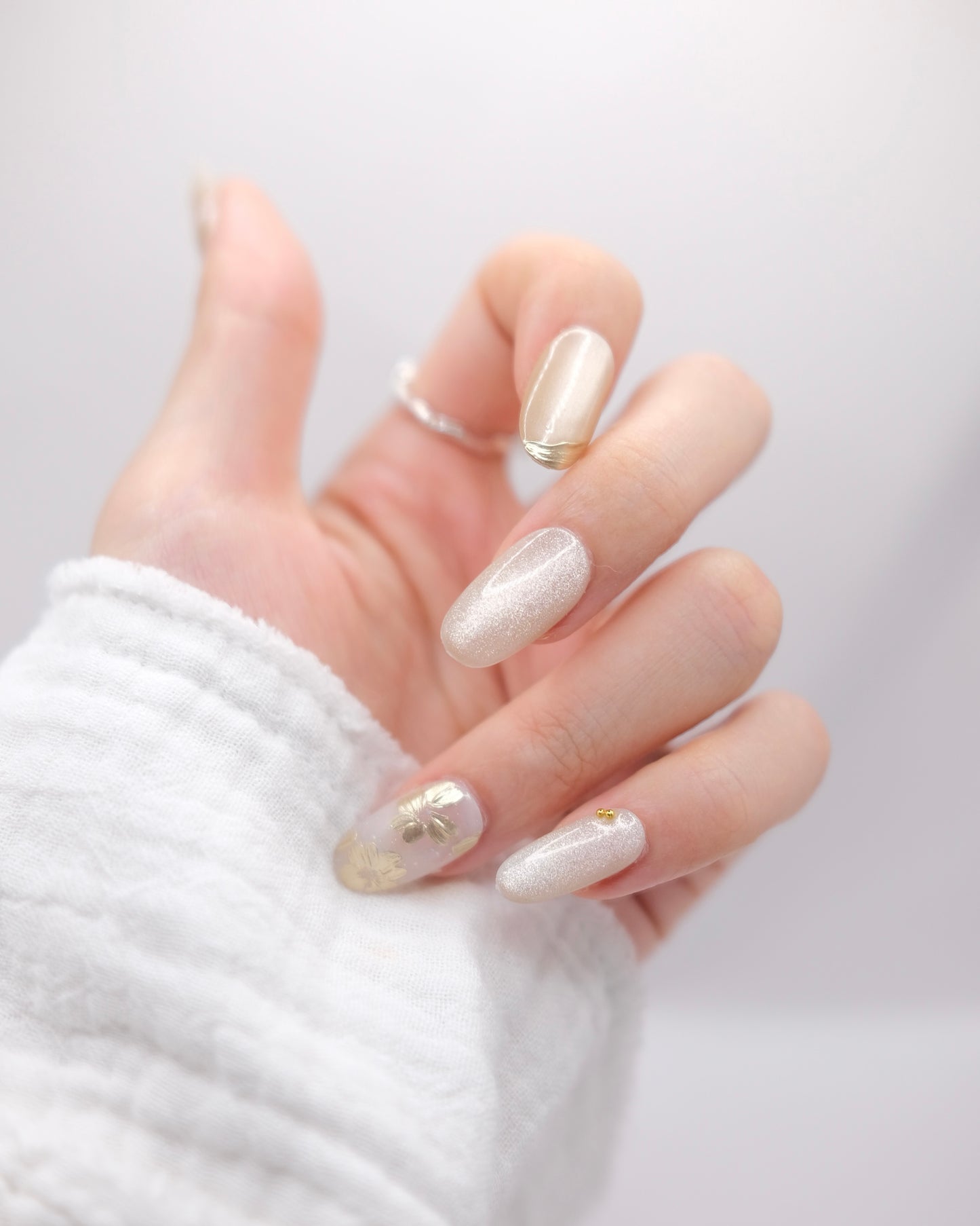 Mid-Long Almond Gold & White Cateye Embossed Flower Press On Nails