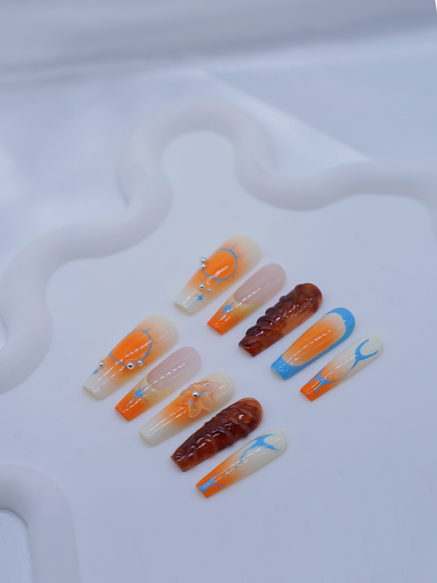 Extra Long Coffin Orange Embossed Psychedelic Sunset Press On Nails