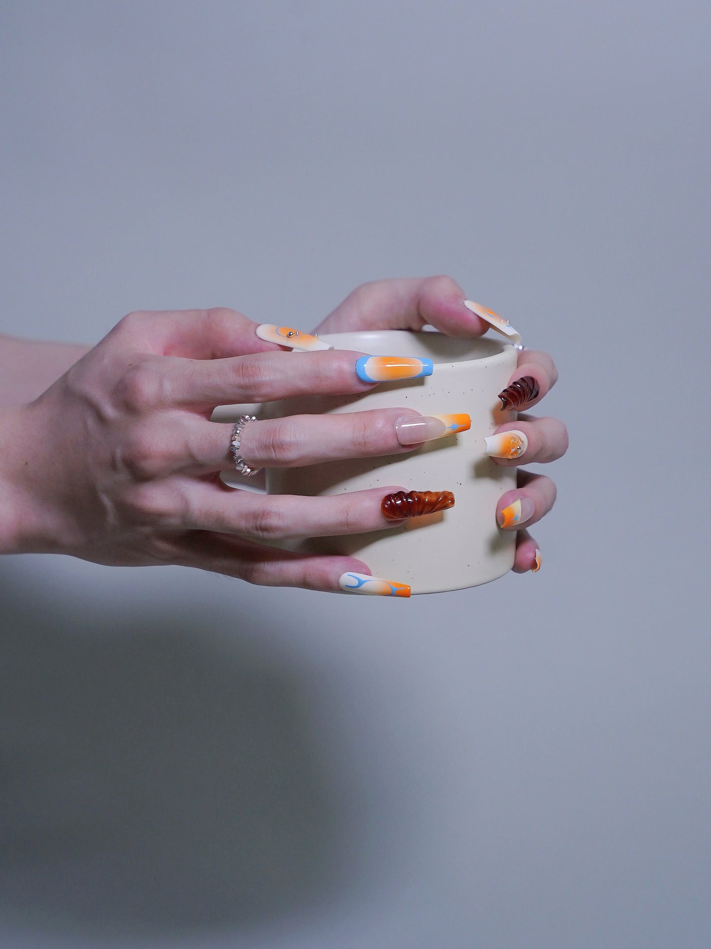 Extra Long Coffin Orange Embossed Psychedelic Sunset Press On Nails