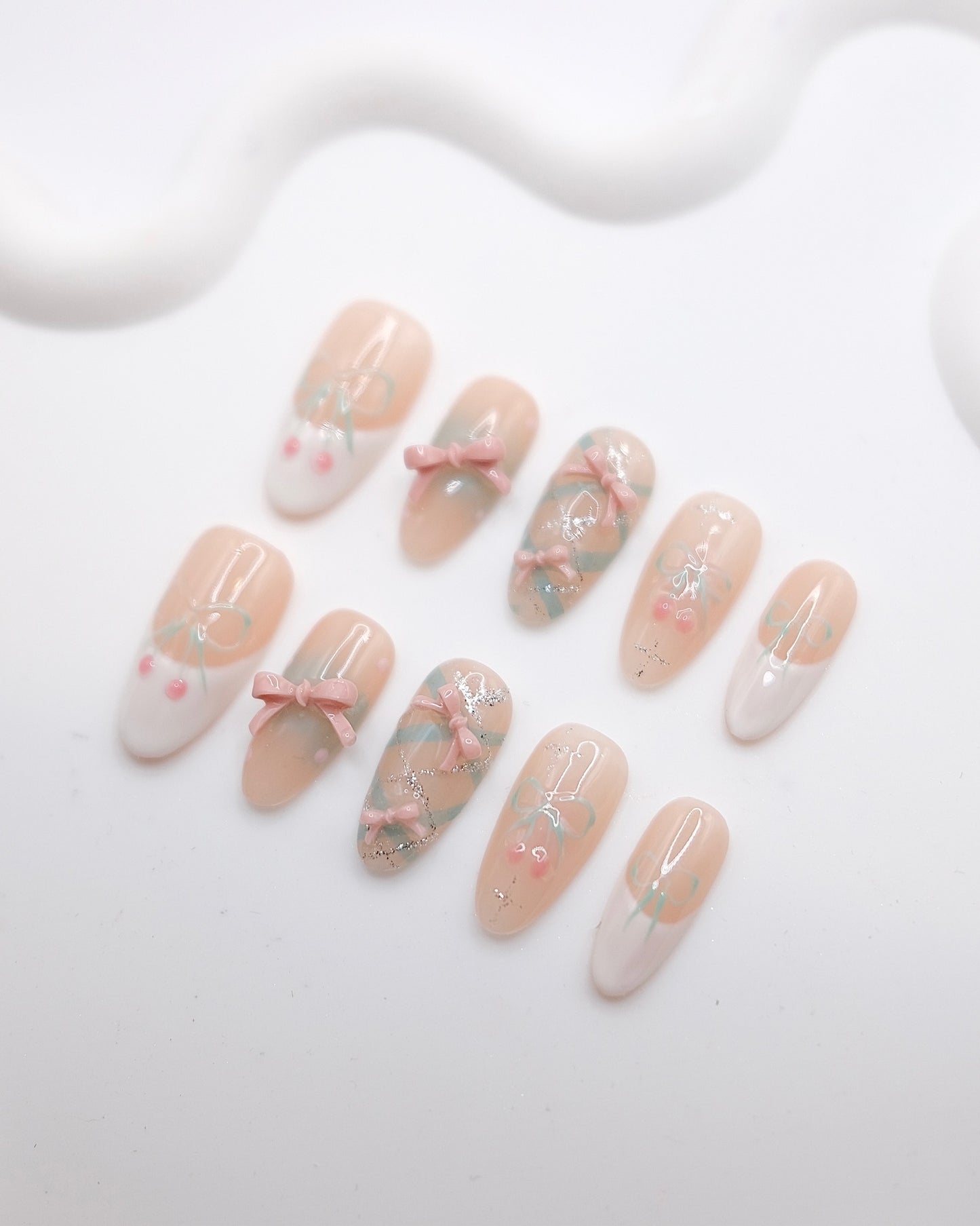 Long Oval Nude Color With White French Manicure & Embossed Bowtie Press On Nails