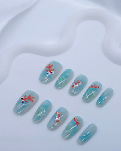 Mid-Long Oval Blue Embossed Goldfish Press On Nails