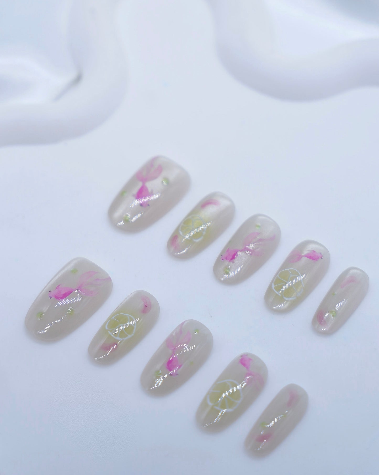 Mid-Long Oval Cateye Embossed Water Lily Goldfish Press On Nails