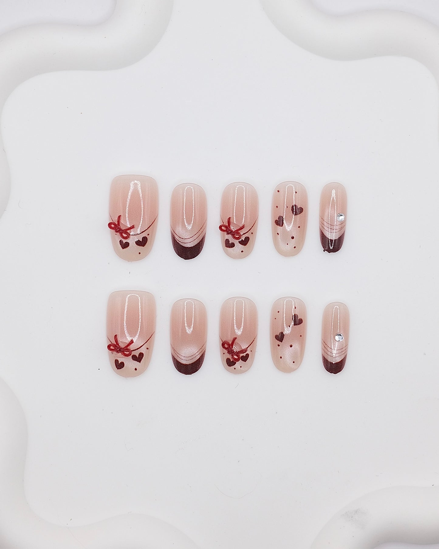 Mid-Long Oval Nude Color & Red Bowtie Press On Nails