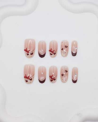 Mid-Long Oval Nude Color & Red Bowtie Press On Nails