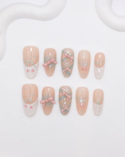Long Oval Nude Color With White French Manicure & Embossed Bowtie Press On Nails