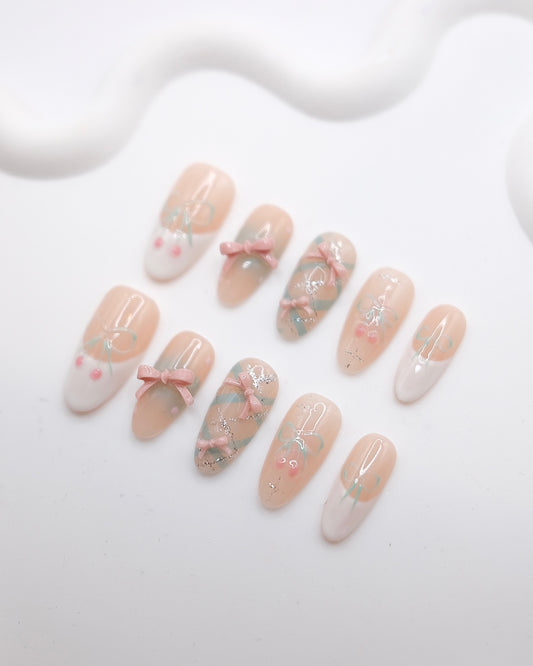 Long Oval Nude Color With White French Manicure & Embossed Bowtie Press On Nails